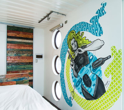Barbarella themed mural for Winebox shipping container hotel