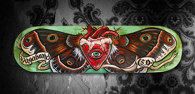 Heart and Eye with moth wings on a skateboard