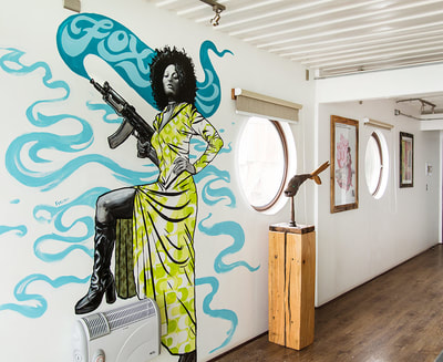 Foxy Brown mural for Winebox shipping container hotel
