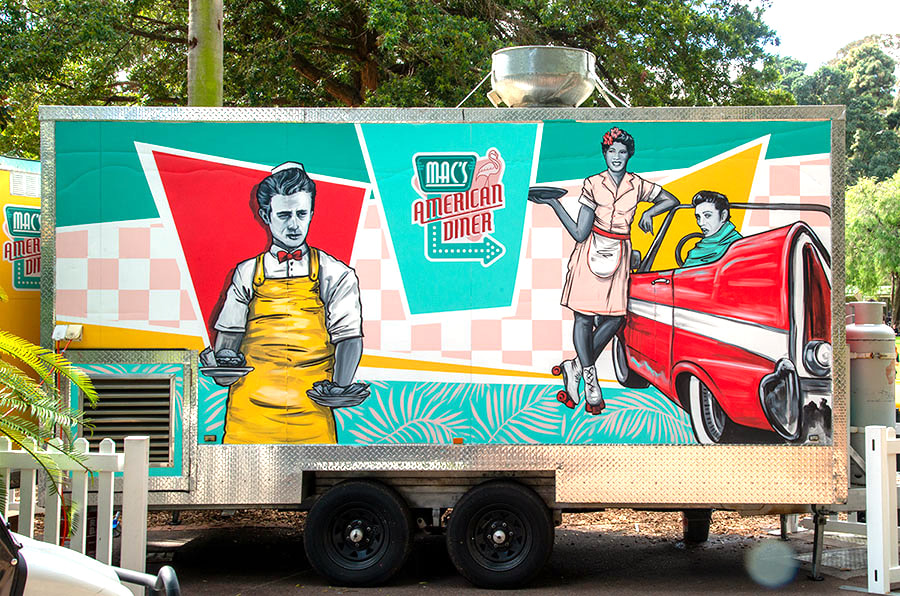 Hand-painted food truck with retro American diner theme, featuring Billie Holiday, Elvis and James Dean