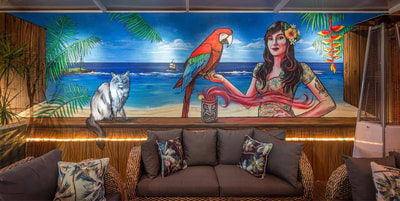 Tiki bar mural with pin up and parrot in a home in Perth, Australia